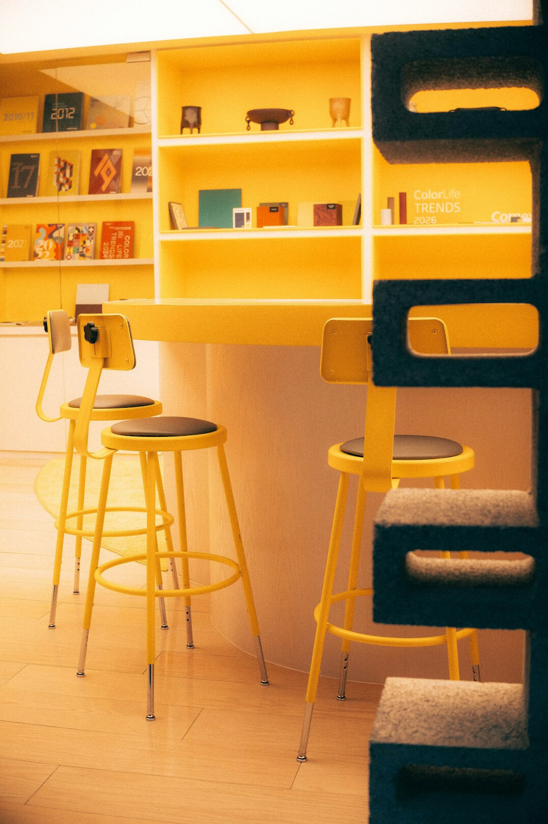 Bright editorial office desk with magazines and design sketches